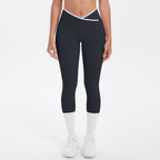Mallas de yoga capri de cintura alta con bloques de color TCOMJFK001