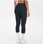 Mallas de yoga capri de cintura alta con bloques de color TCOMJFK001
