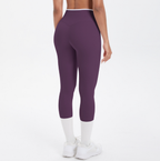 Mallas de yoga capri de cintura alta con bloques de color TCOMJFK001